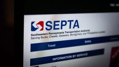 Close-up of screen with SEPTA public transit information.
