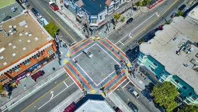 Aerial view of rainbow painted four-way crosswalk in the Castro district, San Francisco, California.