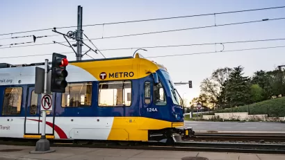 White and yellow Metro Transit streetcar in Minneapolis, Minnesota.