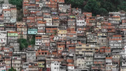 Dense informal settlement on steep hillside in Brazil.