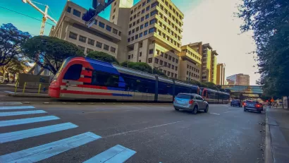 Blue and red light rail train in downtown Houston, Texas.