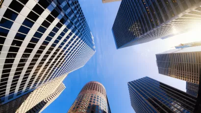 Looking up at cluster of high-rise modern office buildings in San Francisco, California.