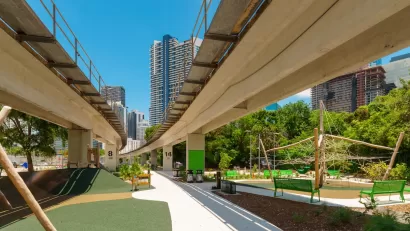 Pedestrian and bike trail under Miami Metroline elevated tracks.
