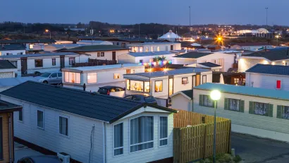 Mobile home park at dusk.
