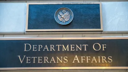 Plaque with 'Department of Veterans Affairs' below plaque with seal.