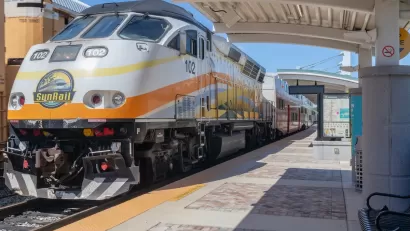 SunRail passenger train at platform in Poinciana, Florida.