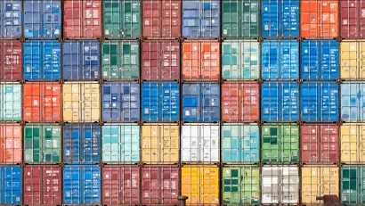 Multilevel stack of colorful shipping containers
