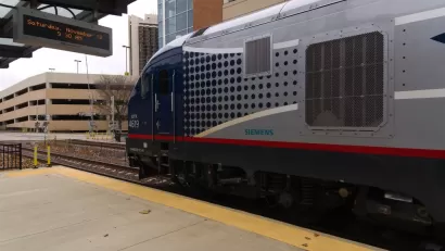 An Amtrak train waits at the Uptown Station in Normal, Illinois on its way from Chicago to St. Louis.