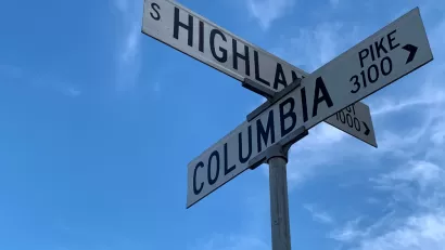Street signs at the intersection of Columbia Pike and Highland in Arlington, Virginia.