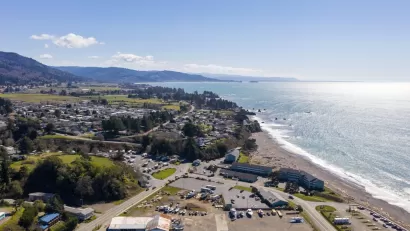 An aerial image of the city of Brookings, Oregon, a small town located on the Pacific Coast.