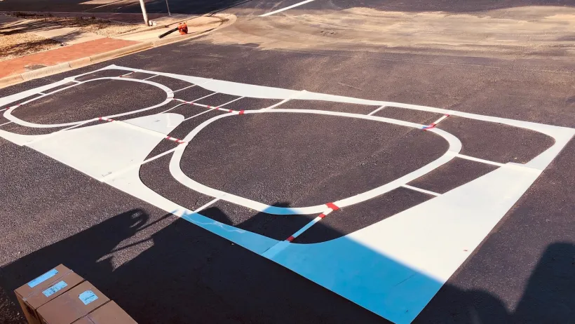 Crosswalk in Lubbock, Texas painted with Buddy Holly style glasses.