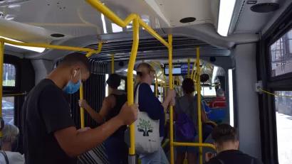 Bus riders wearing masks on a New York City bus