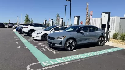 Electric car charging area in a parking lot at a Costco in Clermont, Florida.
