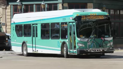 Teal Detroit public bus