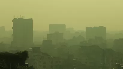 Air pollution is visible in the air around high-rise buildings in Dhaka, Bangladesh.