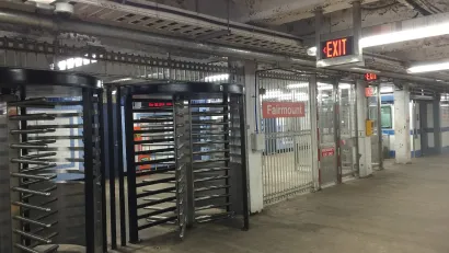 Floor-to-ceiling rotating gates at Fairmount subway station in Philadelphia, Pennsylvania.
