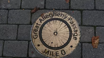 A mile marker showing mile zero of the Great Allegheny Passage, which is a bike and pedestrian path that begins in Cumberland, Maryland and ends in Pittsburgh, Pennsylvania.