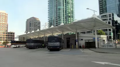 Greyhound and Amtrak buses at a temporary bus terminal in San Francisco, California.