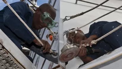 USS Arleigh Burke Sailors perform preservation maintenance