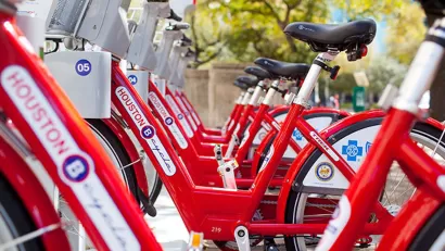 Close-up of red Houston BCycle bike share bikes parked at a station