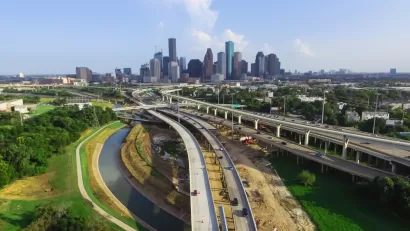 A view of Houston's freeways, with downtown in the background.