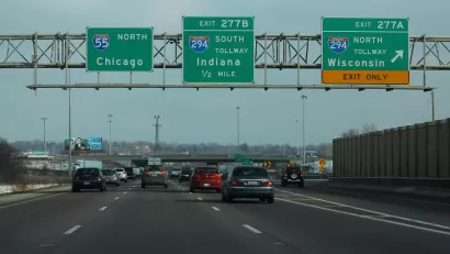 Interstate 55 with cars and green freeway signs in Chicago, Illinois