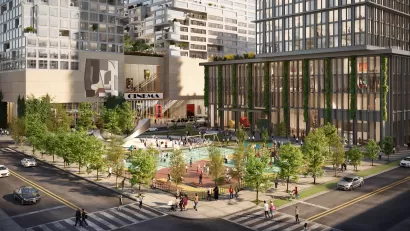 Rendering of Innovation QNS with landscaped open public space on corner and glass-clad building