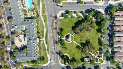 A aerial view of Ladera Ranch, California, showing a variety of buildings and open space.