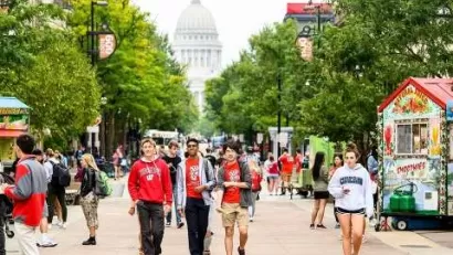 University of Wisconsin Madison students walking down LIbrary Mall pedestrian area in Madison, WI