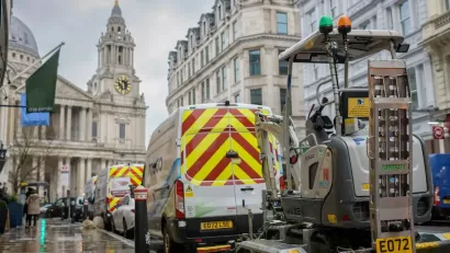 Electric road digger on street construction site in London, UK.