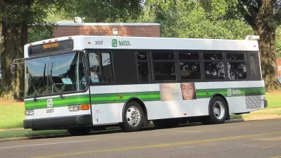 White Memphis Area Transit Authority bus on street in Memphis, Tennessee.