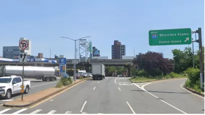Google Maps street view of McGuinness Boulevard, four-lane road in Brooklyn with green sign for I-278W to BQE and Staten Island.