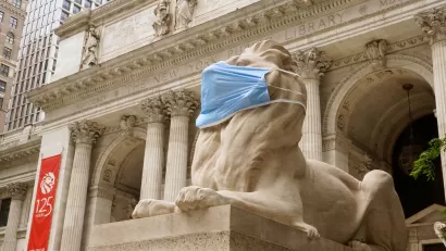 The New York Public Library's stone lions Patience and Fortitude have donned face masks to remind New Yorkers to wear face coverings during the COVID-19 pandemic.