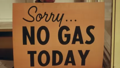A sign reads “Sorry No Gas Today”.