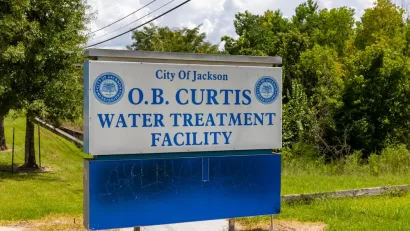 A sign announcing the O.B. Curtis Water Treatment Facility in Jackson, Mississippi