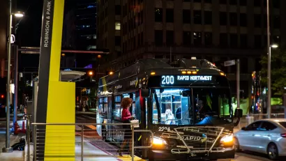 Rapid bus at station at night in Oklahoma City, Oklahoma.