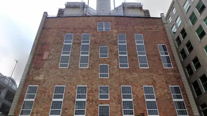 Google street view of red brick multi-story power plant building in Pittsburgh, PA.