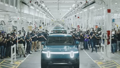 The first R1T built for a customer rolling off Rivian's assembly line at their plant in Normal, IL