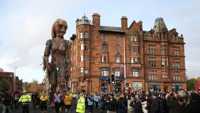 A giant puppet of a sea goddess made entirely of recycled materials walked through Glasgow during the COP26 climate change summit.