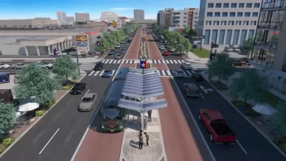 Rendering of bus rapid transit station in center of four-lane street in San Antonio, Texas.