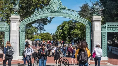 Students passing through the historic Sather Gate on the University of California, Berkeley campus.