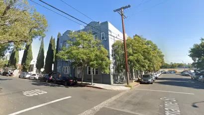 Google Maps street view of intersection of Romaine and Serrano in Los Angeles, California