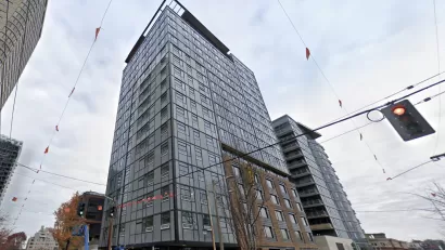 Google Street View looking up at The Rise on Madison high-rise apartment building under construction in Seattle, Washington.