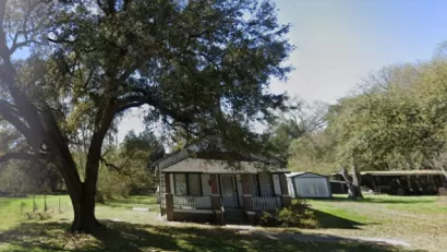 Google Street view of small one-story wooden house in Sandridge, South Carolina