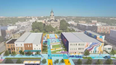 Rendering of redeveloped public square in Denton, Texas with new pedestrian and public infrastructure and historic courthouse in background.