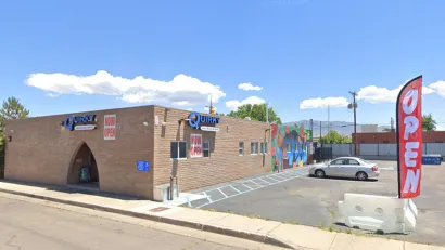 Google street view of bookstore in brick building in Albuquerque, New Mexico.