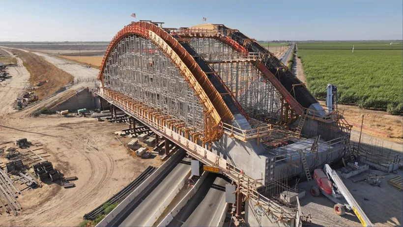Arched bridge under construction for California High-Speed Rail project.