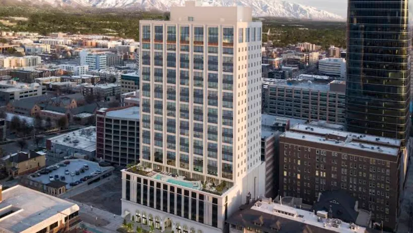 Tall white office building now converted to luxury apartments in Salt lake City, Utah.