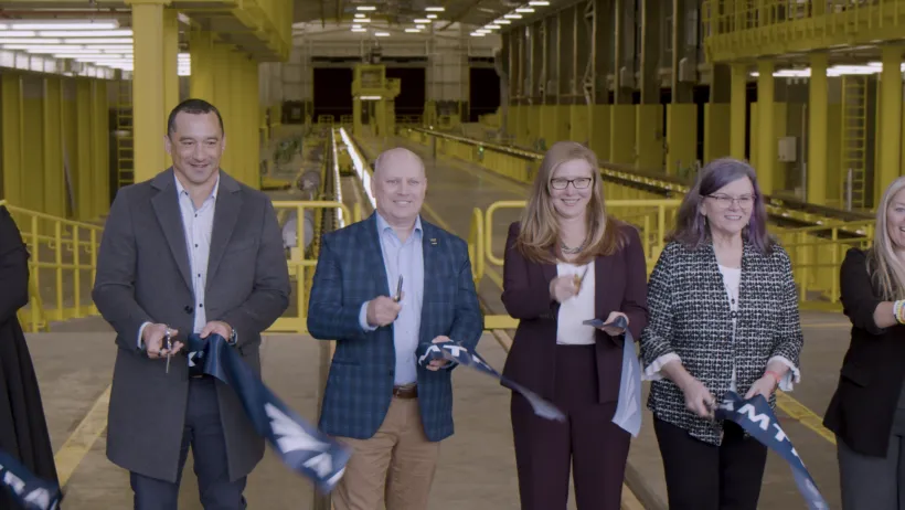 Amtrak officials cut the ribbon at the new Seattle facility.
