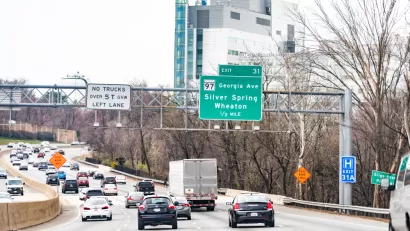 A freeway in Maryland near Washington, D.C., on the Capital Beltway with an exit sign for Wheaton.
